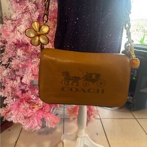 Coach Tan Leather Crossbody Bag with Floral Charm
